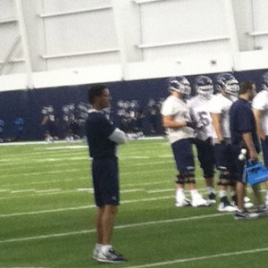 Coach Bob Diaco watching the Huskies open fall camp. (Ken Davis photo)