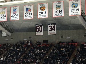 Ray Allen (34) and Rebecca Lobo (50) have new reserved spots in the rafters of Gampel Pavilion (Ken Davis photo)