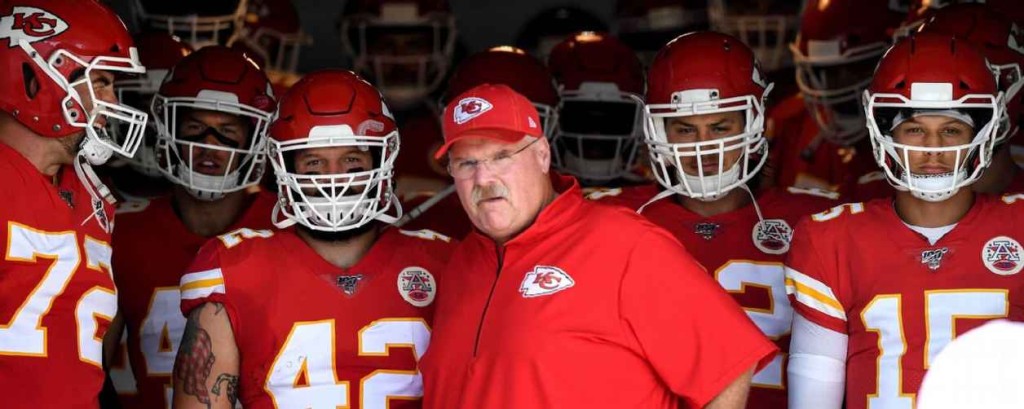 Chiefs coach Andy Reid, ready for battle with UConn fullback Anthony Sherman (42) and quarterback Patrick Mahomes (15).